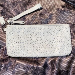 NWT Coach white perforated clutch